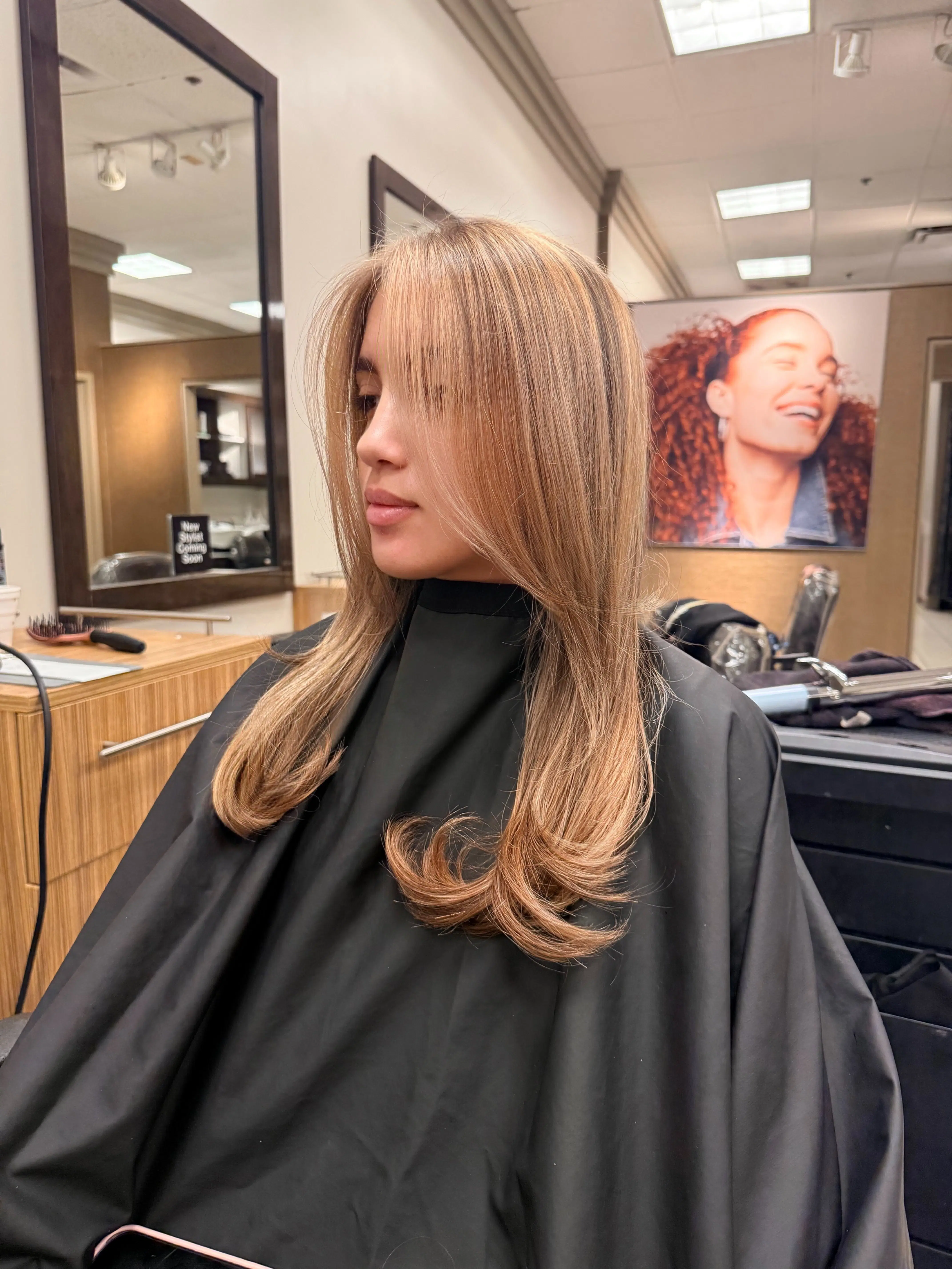 Soft face-framing highlights with curtain layers