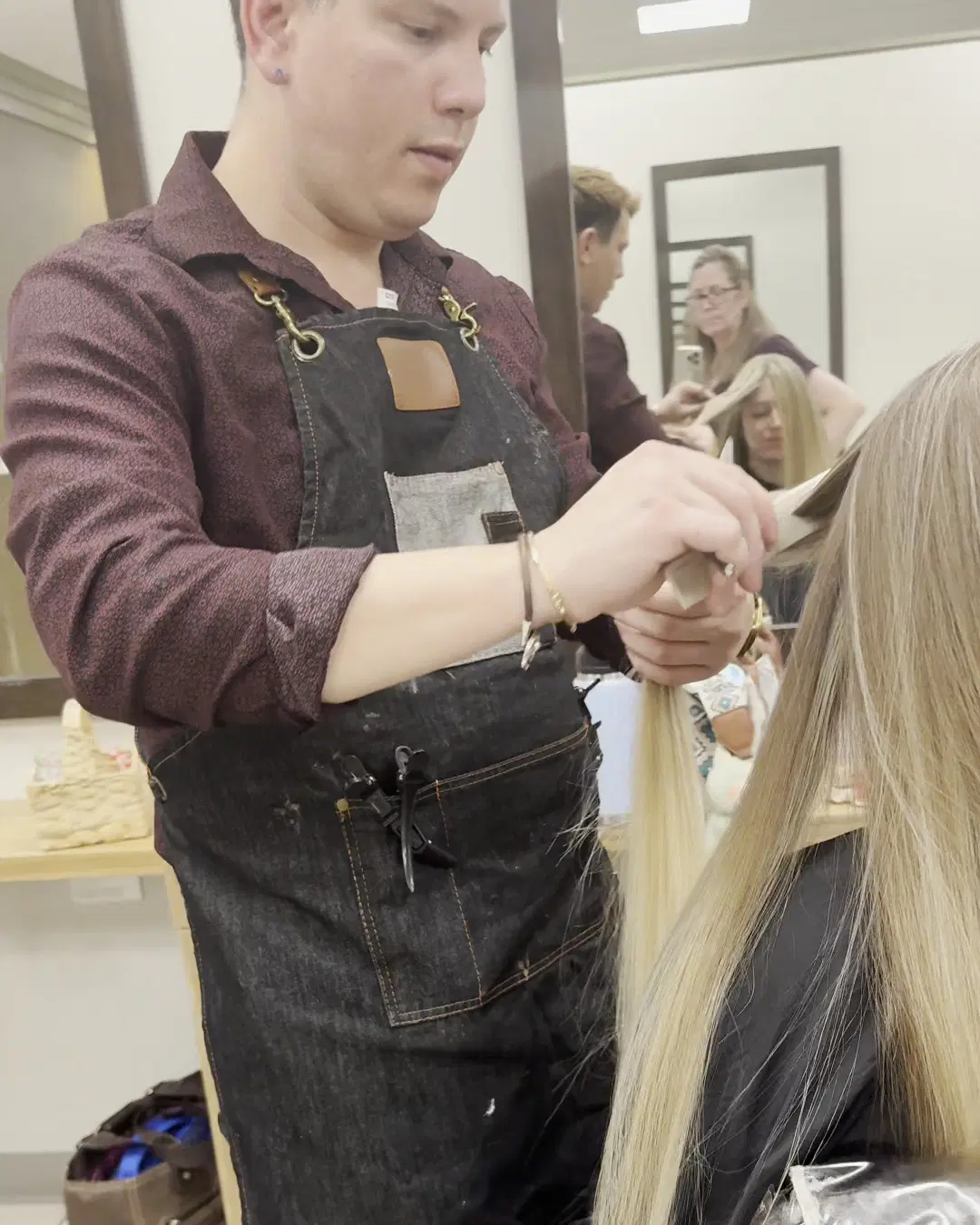 Rudy Perez cutting long blonde hair